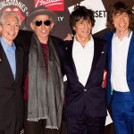 Watts, Richards, Wood and Jagger arrive in London to prep for their UK gigs